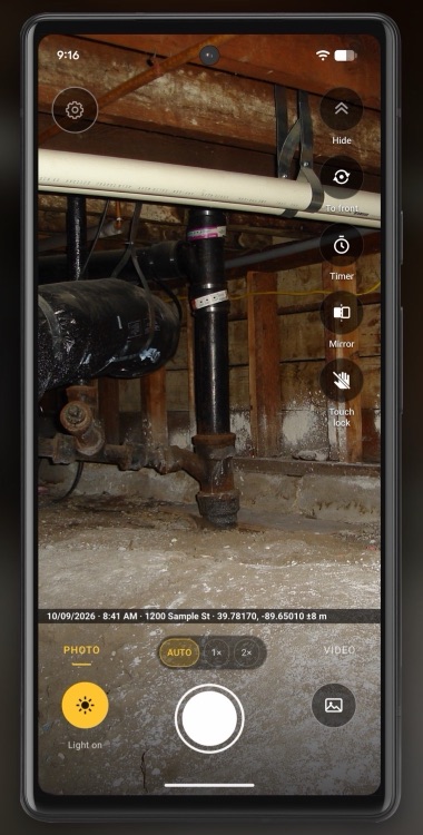 Pro’s camera with the date, time, address and GPS stamp line.