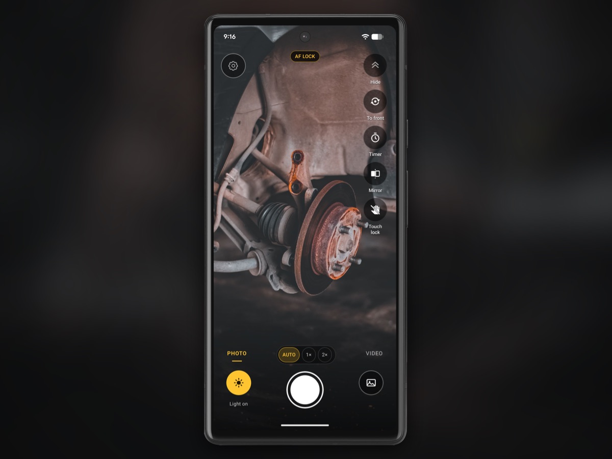 InspectCam open on a phone aimed into a car's wheel well.
